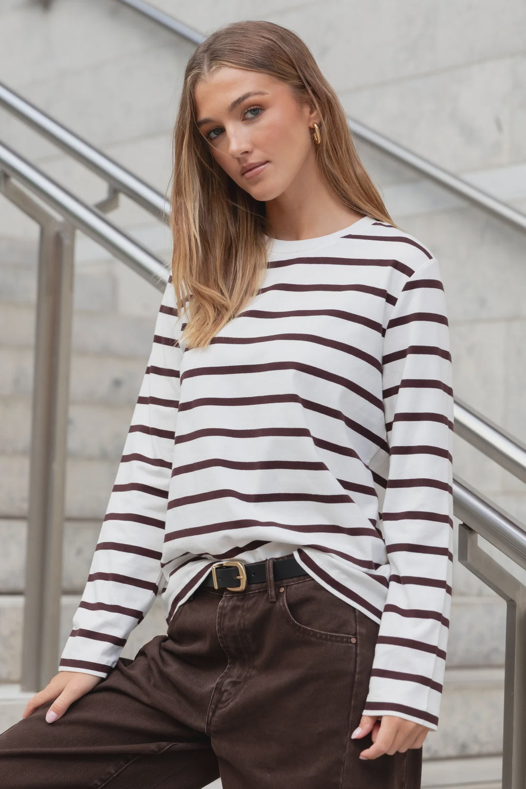 - Chocolate and white horizontal stripe
- Relaxed boxy fit with dropped shoulders
- Long sleeves with soft stretch for comfort
- Crew neckline with clean finish
- Fabric - 95% cotton, 5% elastane
- Natural fibre