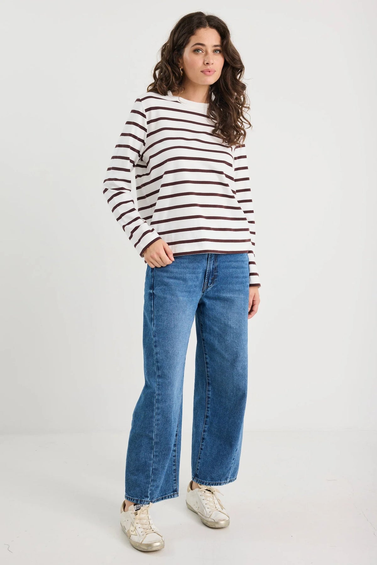 - Chocolate and white horizontal stripe
- Relaxed boxy fit with dropped shoulders
- Long sleeves with soft stretch for comfort
- Crew neckline with clean finish
- Fabric - 95% cotton, 5% elastane
- Natural fibre