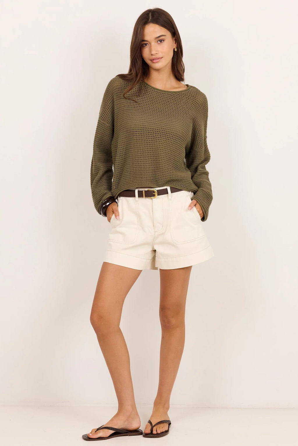 - Classic crew neck design&nbsp;
- Crochet knit&nbsp;
- Relaxed fit with long sleeves
- Light Khaki colourway
- Fabric - 100% cotton