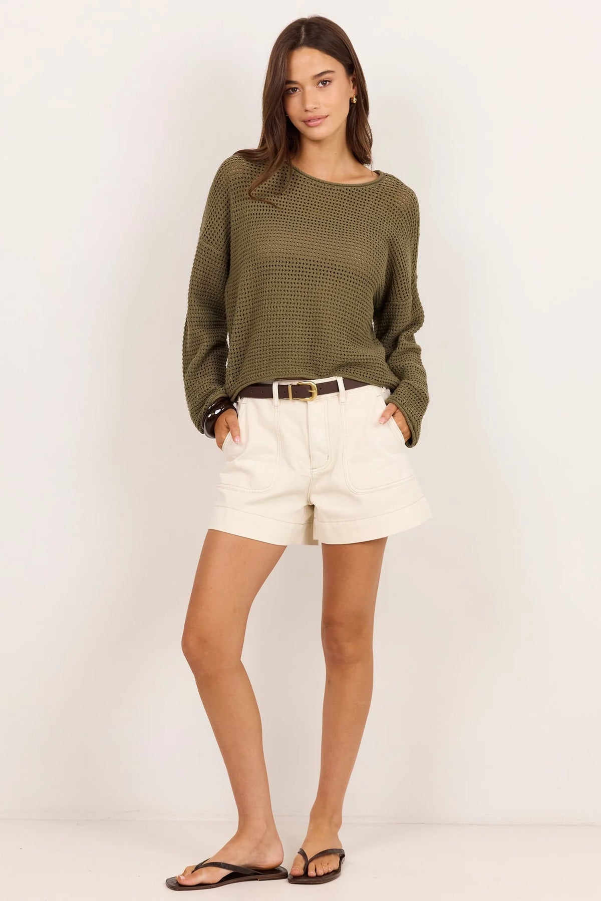 - Classic crew neck design&nbsp;
- Crochet knit&nbsp;
- Relaxed fit with long sleeves
- Light Khaki colourway
- Fabric - 100% cotton