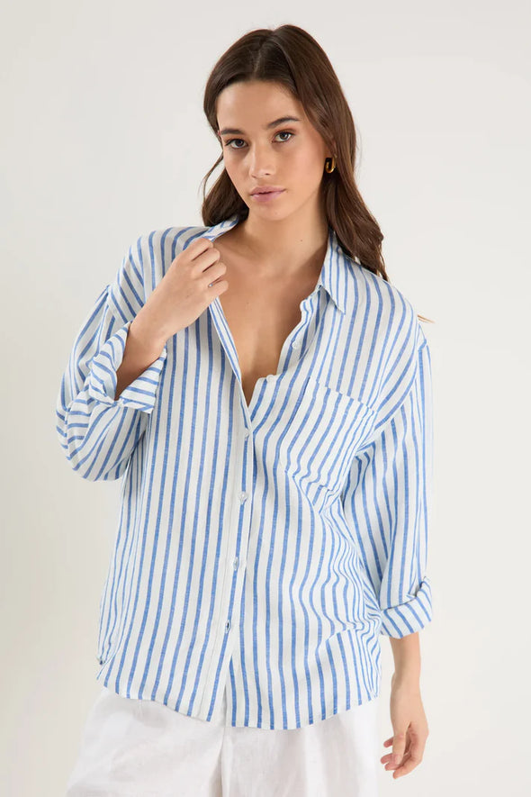 Oversized silhouette for a relaxed, contemporary fit

Long sleeves with button cuffs for versatile rolling and styling

Vertical stripe print for a timeless and flattering look

Full button-front design for easy layering and styling options

Soft, breathable linen-viscose blend for all-day comfort

Fabric: 55% Linen, 45% Viscose