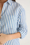 Oversized silhouette for a relaxed, contemporary fit

Long sleeves with button cuffs for versatile rolling and styling

Vertical stripe print for a timeless and flattering look

Full button-front design for easy layering and styling options

Soft, breathable linen-viscose blend for all-day comfort

Fabric: 55% Linen, 45% Viscose