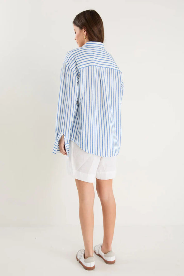 Oversized silhouette for a relaxed, contemporary fit

Long sleeves with button cuffs for versatile rolling and styling

Vertical stripe print for a timeless and flattering look

Full button-front design for easy layering and styling options

Soft, breathable linen-viscose blend for all-day comfort

Fabric: 55% Linen, 45% Viscose