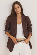 Rich chocolate colour

Classic lapel and structured shoulders

Long sleeves

Two-button front fastening

Flap pockets

Fully lined

Natural linen outer fabric