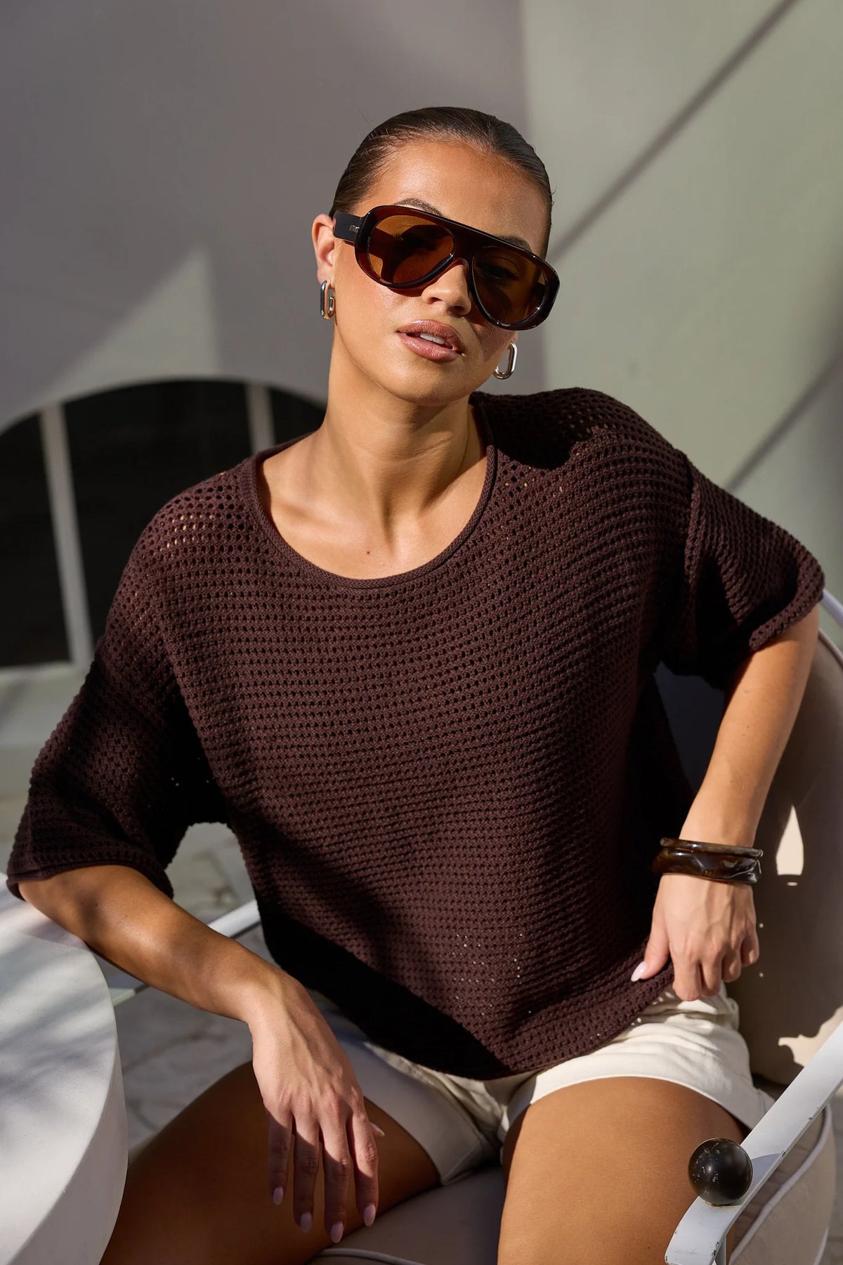 - Crew neckline
- Short sleeves
- Open crochet knit texture
- Relaxed fit
- Fabric Composition - 100% Cotton
- Natural fibre