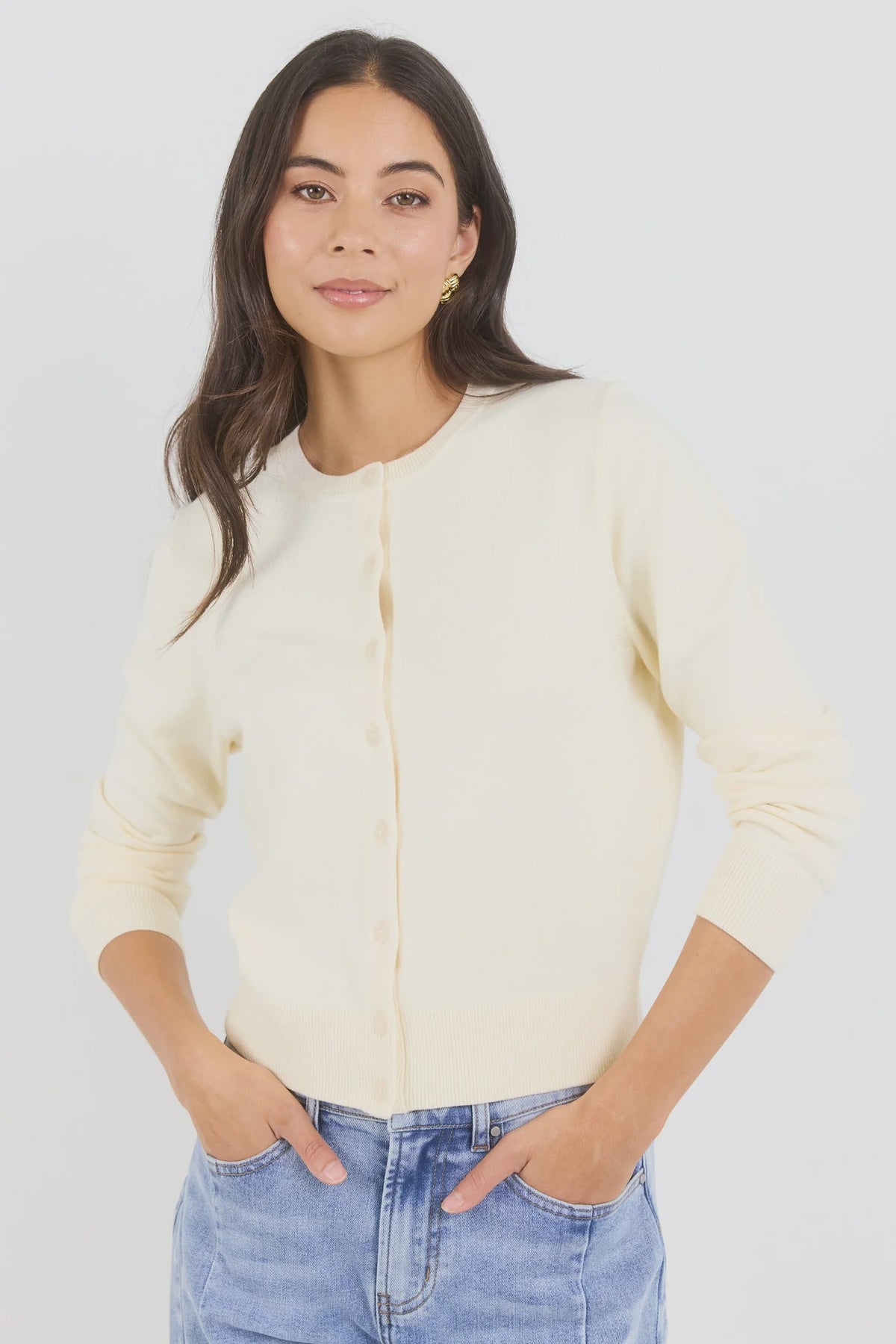 - Long sleeve design
- Crew neckline
- Button-front closure
- Fine gauge knit
- Soft butter colourway
- Ribbed cuffs, neckline and hem
- Fabric - 34% Nylon 34% Viscose 21% Polyester 8% Elastane 3% Cashmere
- Delicate, treat with care