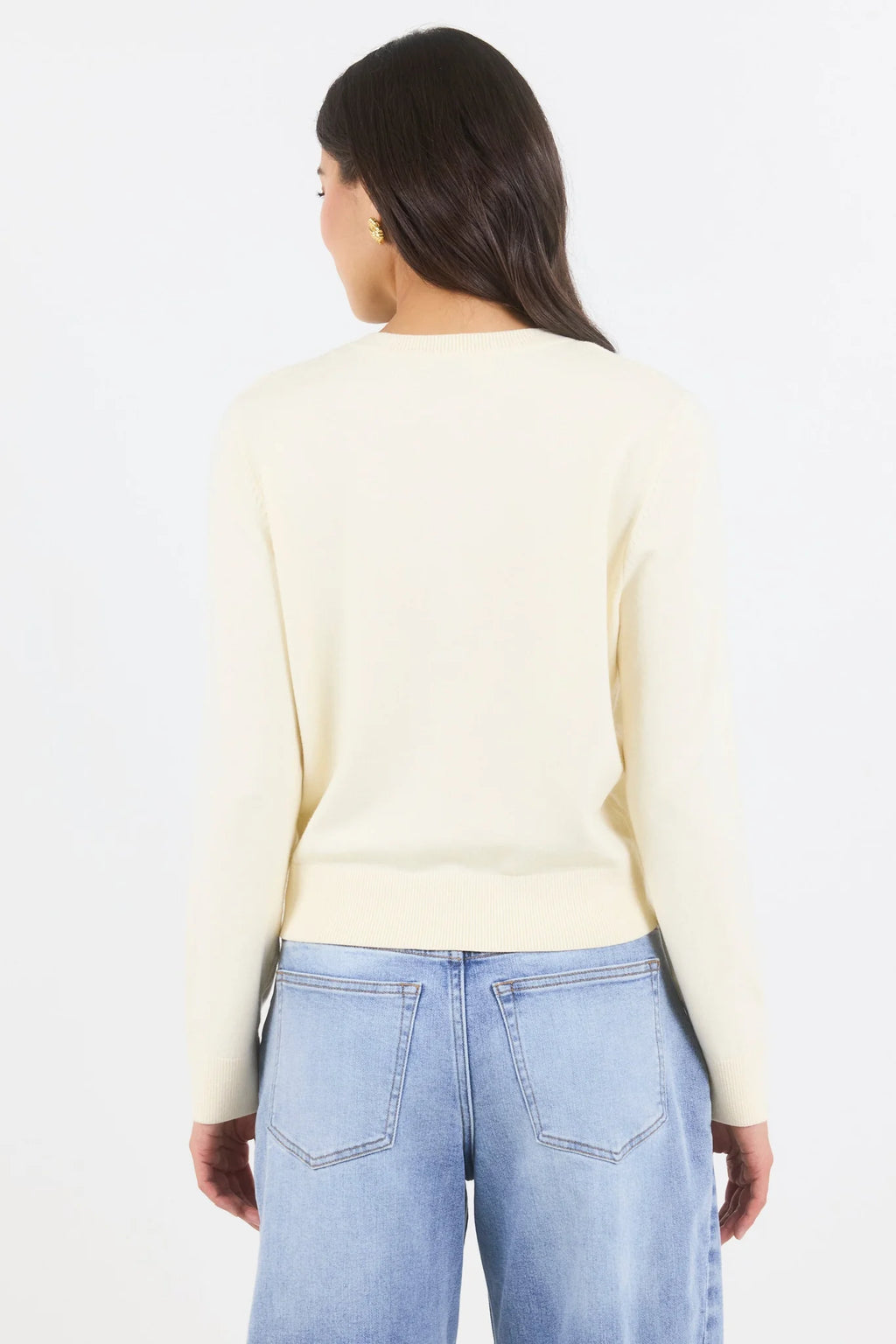 - Long sleeve design
- Crew neckline
- Button-front closure
- Fine gauge knit
- Soft butter colourway
- Ribbed cuffs, neckline and hem
- Fabric - 34% Nylon 34% Viscose 21% Polyester 8% Elastane 3% Cashmere
- Delicate, treat with care