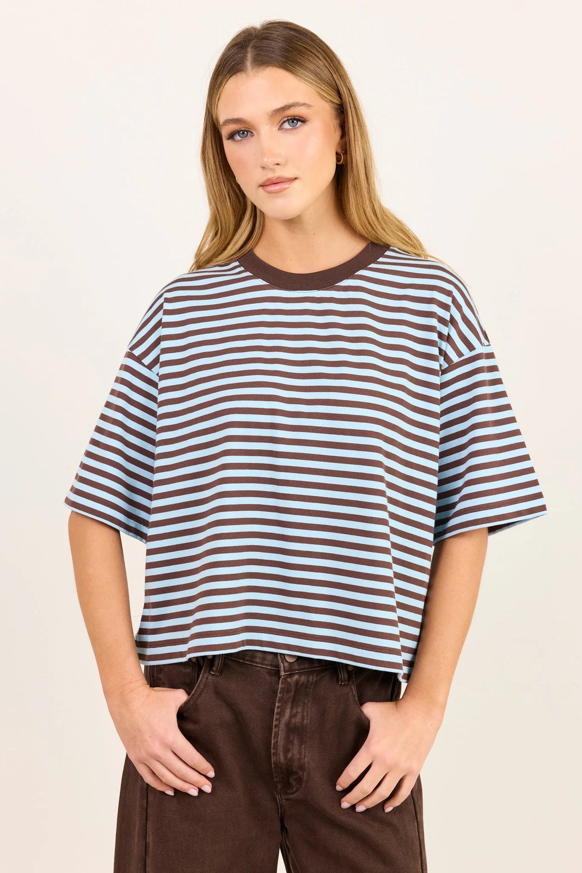 - Oversized boxy fit
- Ice blue and chocolate stripe design
- Contrast chocolate crew neckline
- Dropped shoulders
- Short sleeves
- Fabric Composition - 50%COTTON 50%POLYESTER