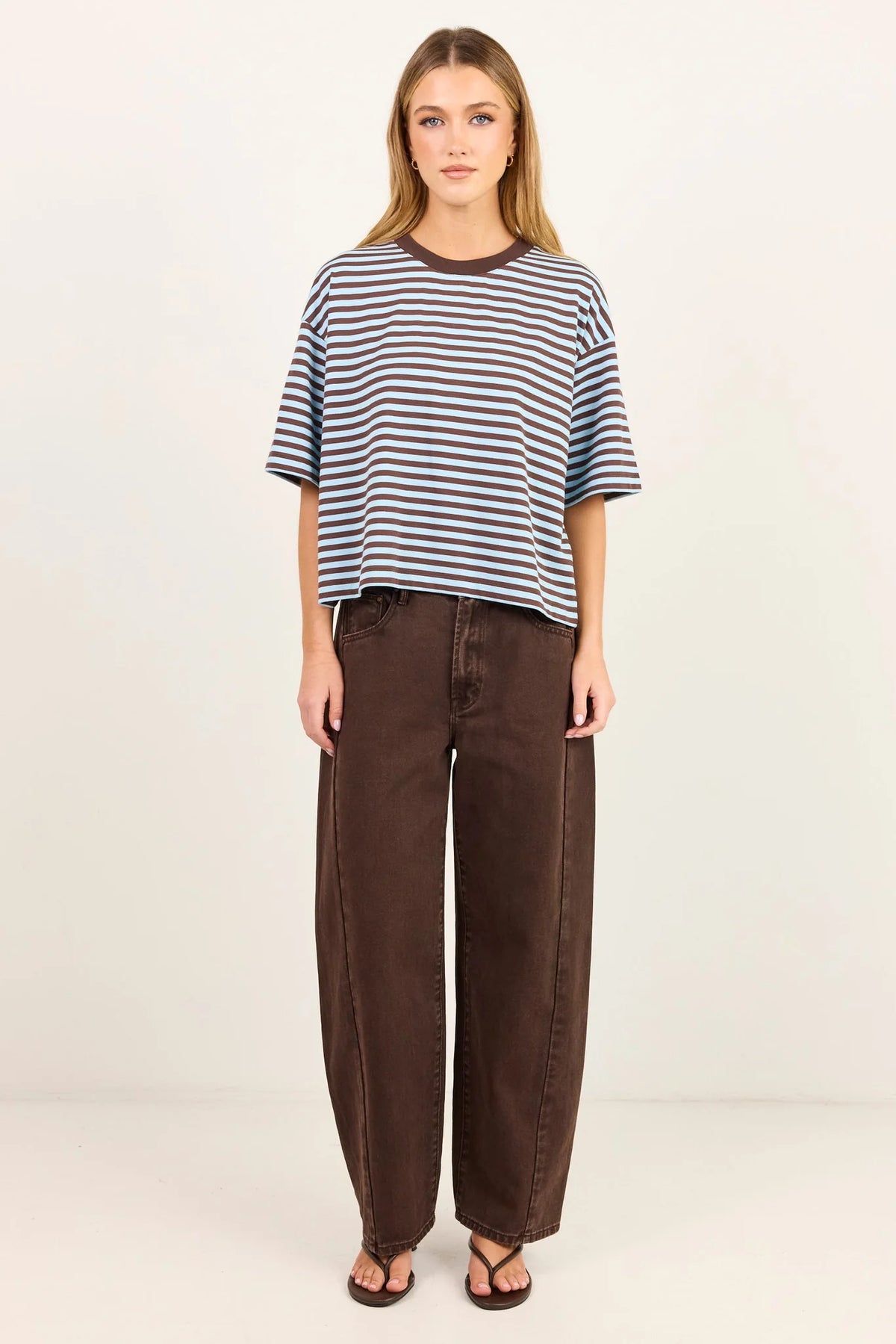 - Oversized boxy fit
- Ice blue and chocolate stripe design
- Contrast chocolate crew neckline
- Dropped shoulders
- Short sleeves
- Fabric Composition - 50%COTTON 50%POLYESTER
