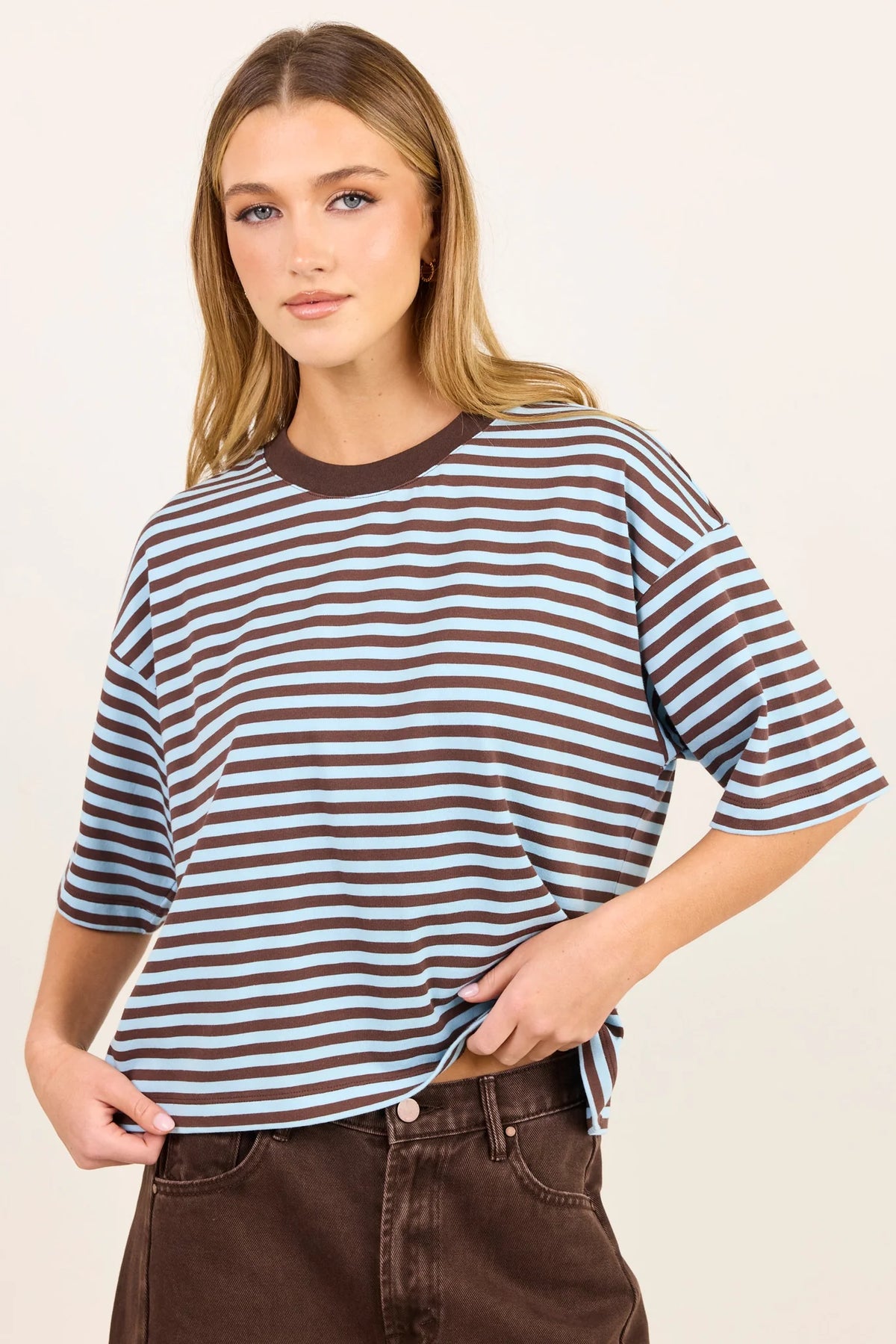- Oversized boxy fit
- Ice blue and chocolate stripe design
- Contrast chocolate crew neckline
- Dropped shoulders
- Short sleeves
- Fabric Composition - 50%COTTON 50%POLYESTER