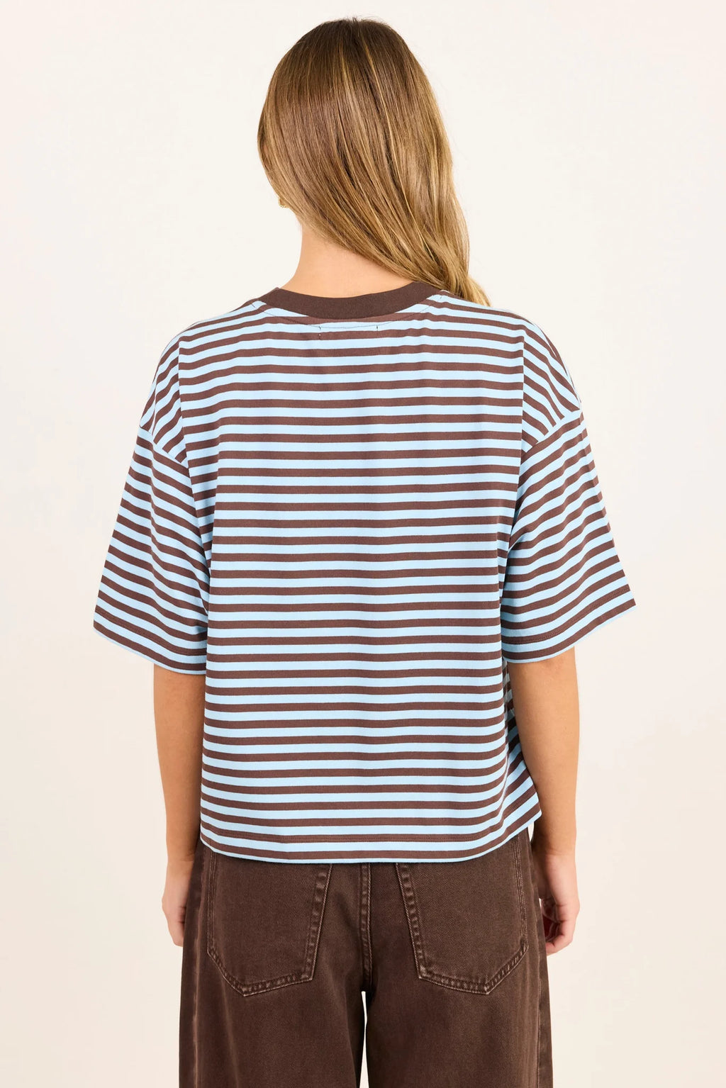 - Oversized boxy fit
- Ice blue and chocolate stripe design
- Contrast chocolate crew neckline
- Dropped shoulders
- Short sleeves
- Fabric Composition - 50%COTTON 50%POLYESTER