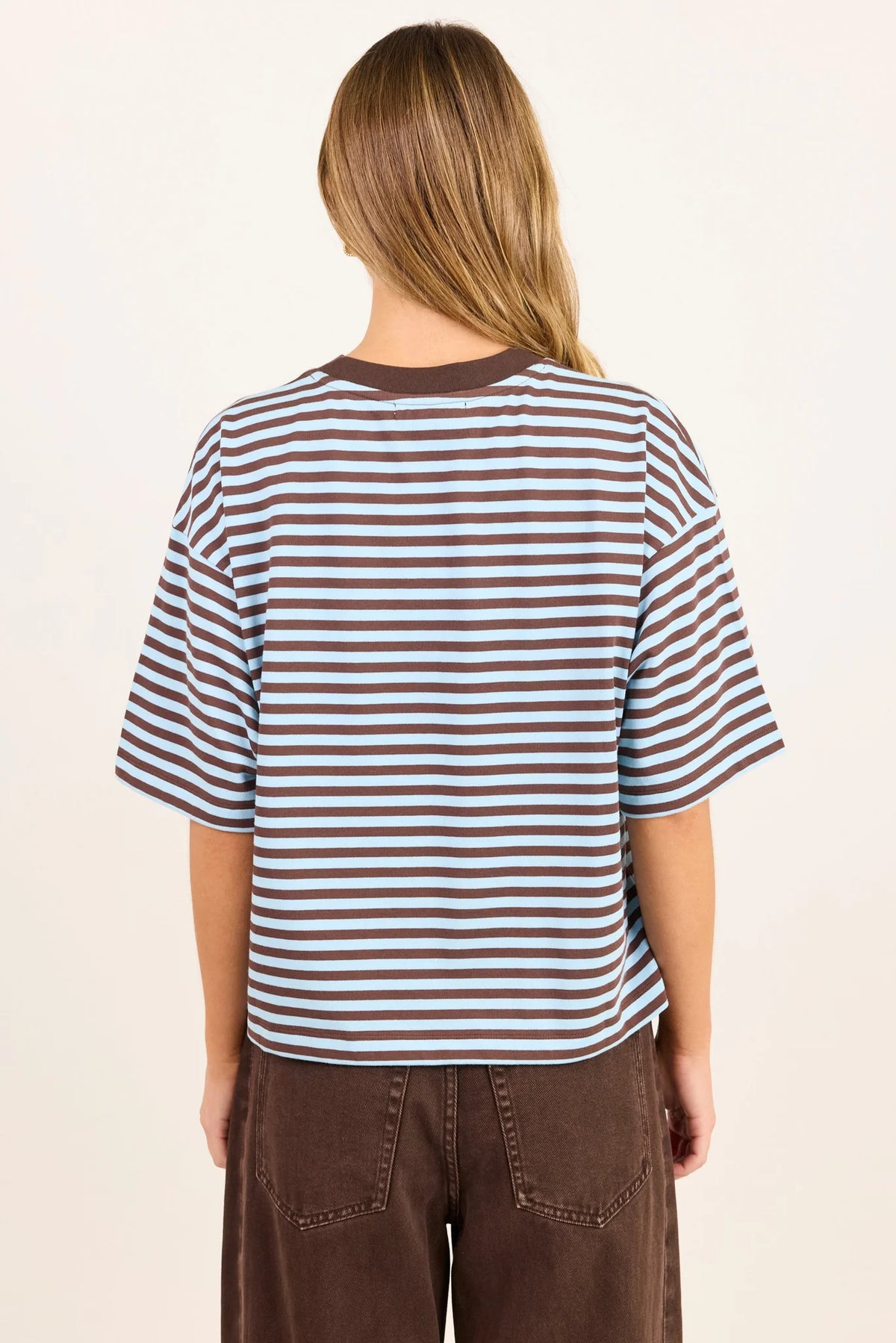 - Oversized boxy fit
- Ice blue and chocolate stripe design
- Contrast chocolate crew neckline
- Dropped shoulders
- Short sleeves
- Fabric Composition - 50%COTTON 50%POLYESTER