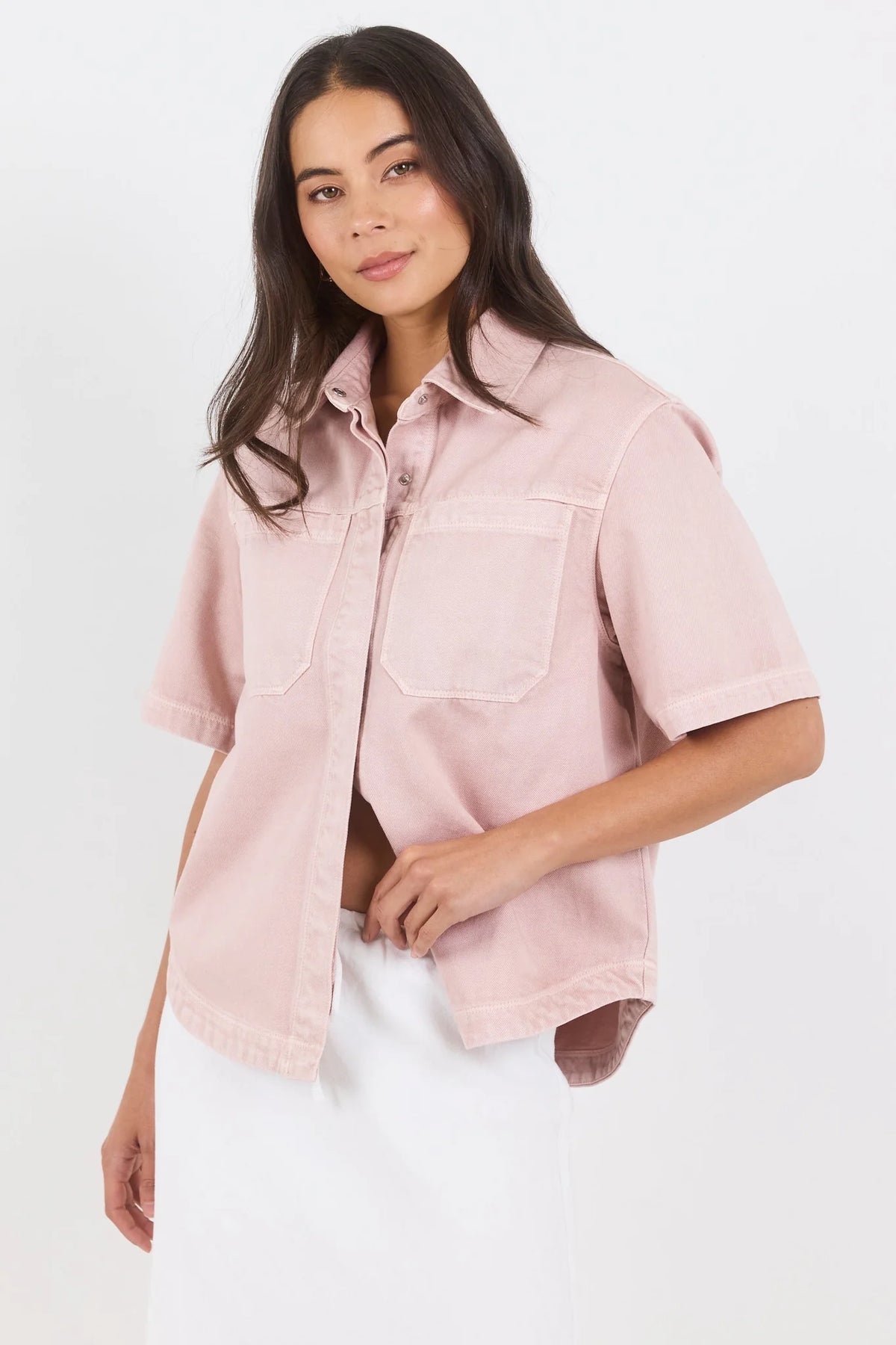 100% cotton for natural softness and breathability

Relaxed short sleeves for all-day comfort

Oversized chest pockets with utilitarian detail

Button front for versatile layering and styling