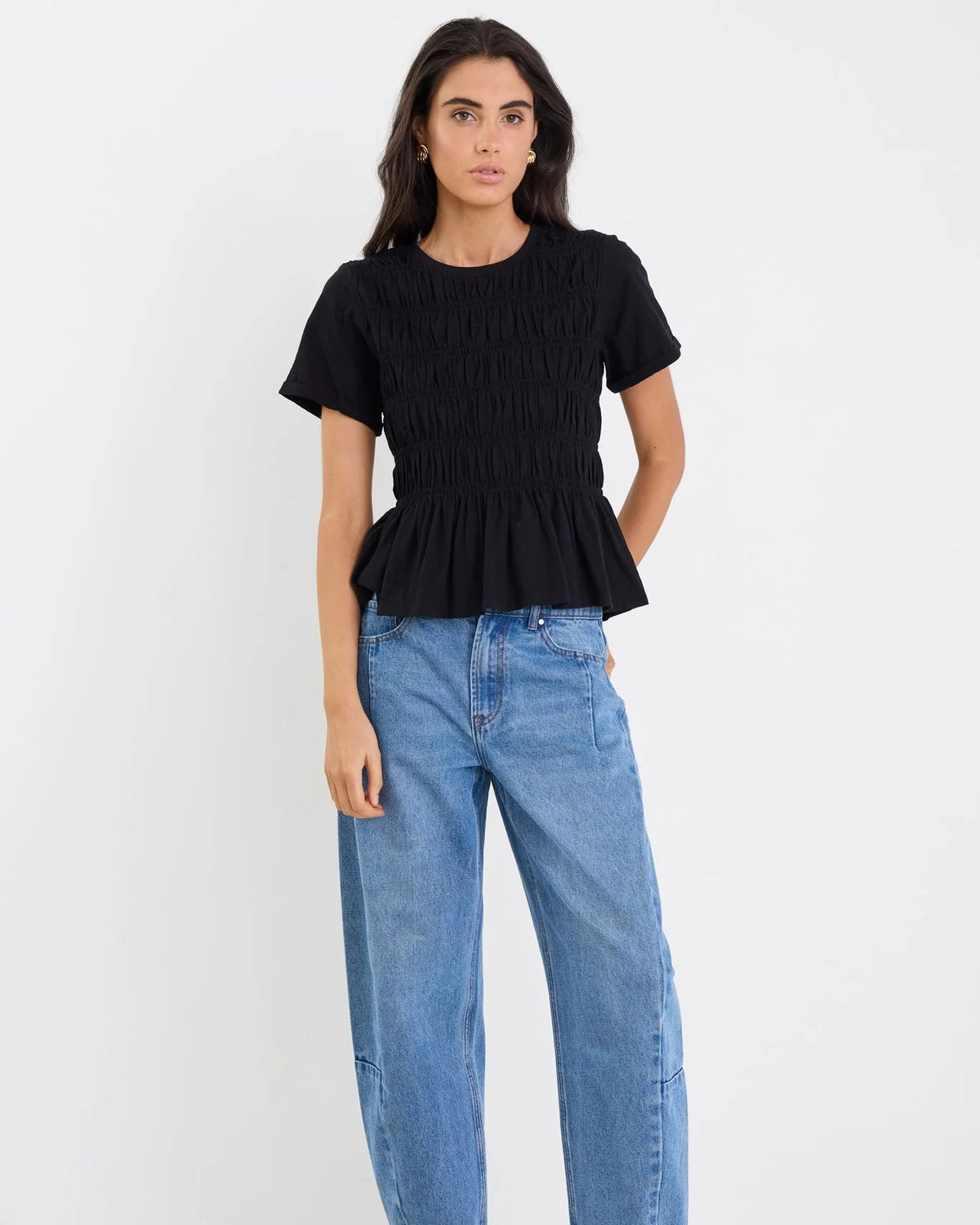 Classic crew neckline

Short sleeves for everyday ease

All-over shirred bodice for a flattering fit

Soft peplum hem adds feminine shape

Easy pull-on design

Made from natural fibres

Fabric composition: 100% cotton