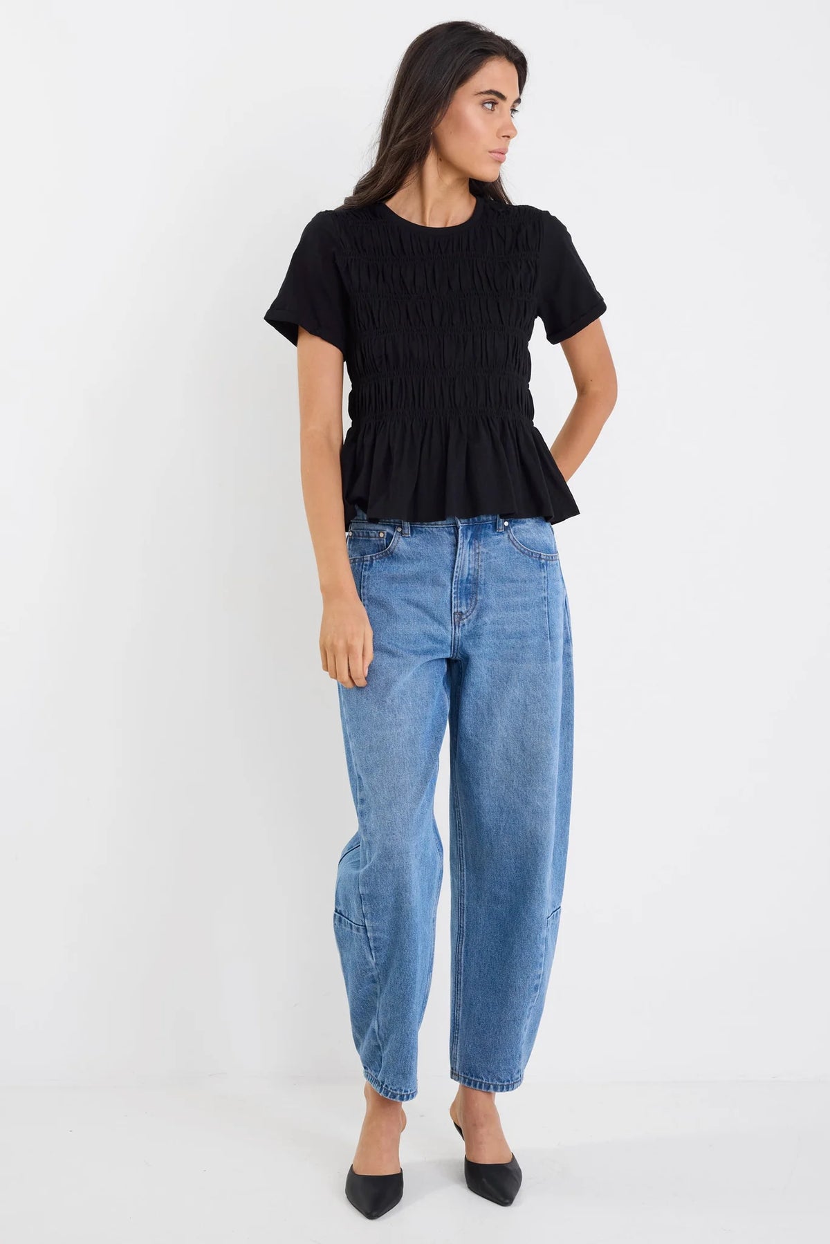Classic crew neckline

Short sleeves for everyday ease

All-over shirred bodice for a flattering fit

Soft peplum hem adds feminine shape

Easy pull-on design

Made from natural fibres

Fabric composition: 100% cotton