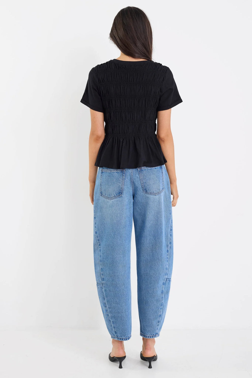 Classic crew neckline

Short sleeves for everyday ease

All-over shirred bodice for a flattering fit

Soft peplum hem adds feminine shape

Easy pull-on design

Made from natural fibres

Fabric composition: 100% cotton