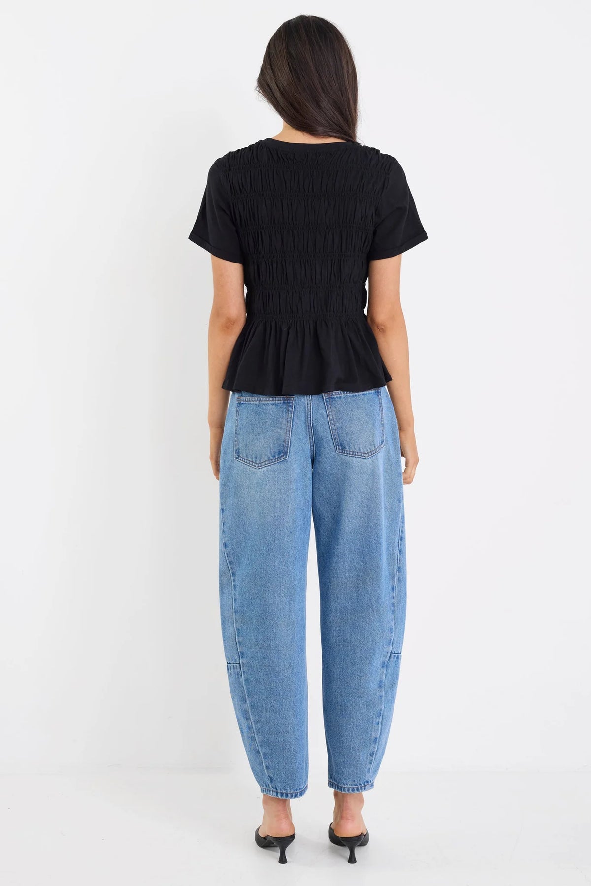 Classic crew neckline

Short sleeves for everyday ease

All-over shirred bodice for a flattering fit

Soft peplum hem adds feminine shape

Easy pull-on design

Made from natural fibres

Fabric composition: 100% cotton