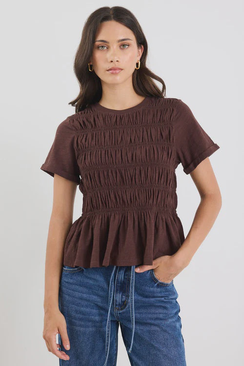 Classic crew neckline

Short sleeves for everyday ease

All-over shirred bodice for a flattering fit

Soft peplum hem adds feminine shape

Easy pull-on design

Made from natural fibres

Fabric composition: 100% cotton