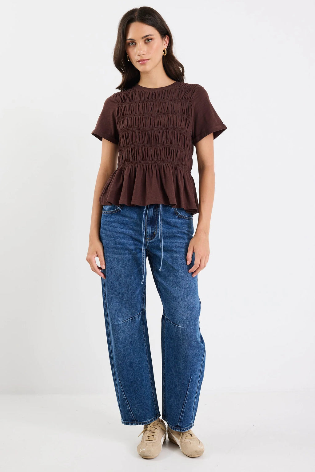 Classic crew neckline

Short sleeves for everyday ease

All-over shirred bodice for a flattering fit

Soft peplum hem adds feminine shape

Easy pull-on design

Made from natural fibres

Fabric composition: 100% cotton