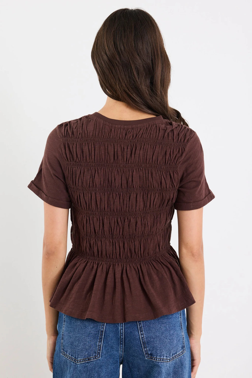 Classic crew neckline

Short sleeves for everyday ease

All-over shirred bodice for a flattering fit

Soft peplum hem adds feminine shape

Easy pull-on design

Made from natural fibres

Fabric composition: 100% cotton