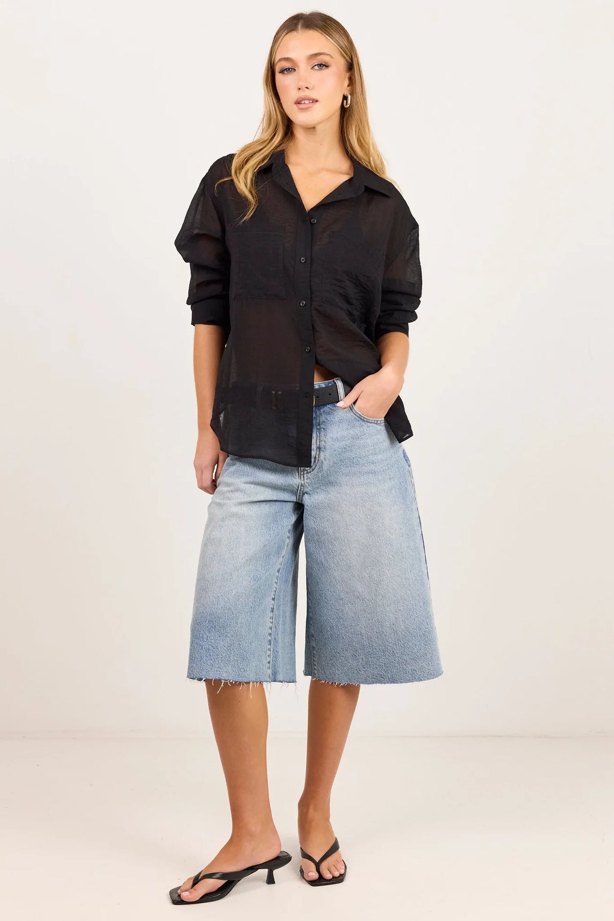 - Classic collar
- Long sleeves
- Button-through front
- Relaxed oversized fit
- Semi-sheer fabrication
- Delicate garment care
- Fabric Composition - 70% Viscose 30% Nylon