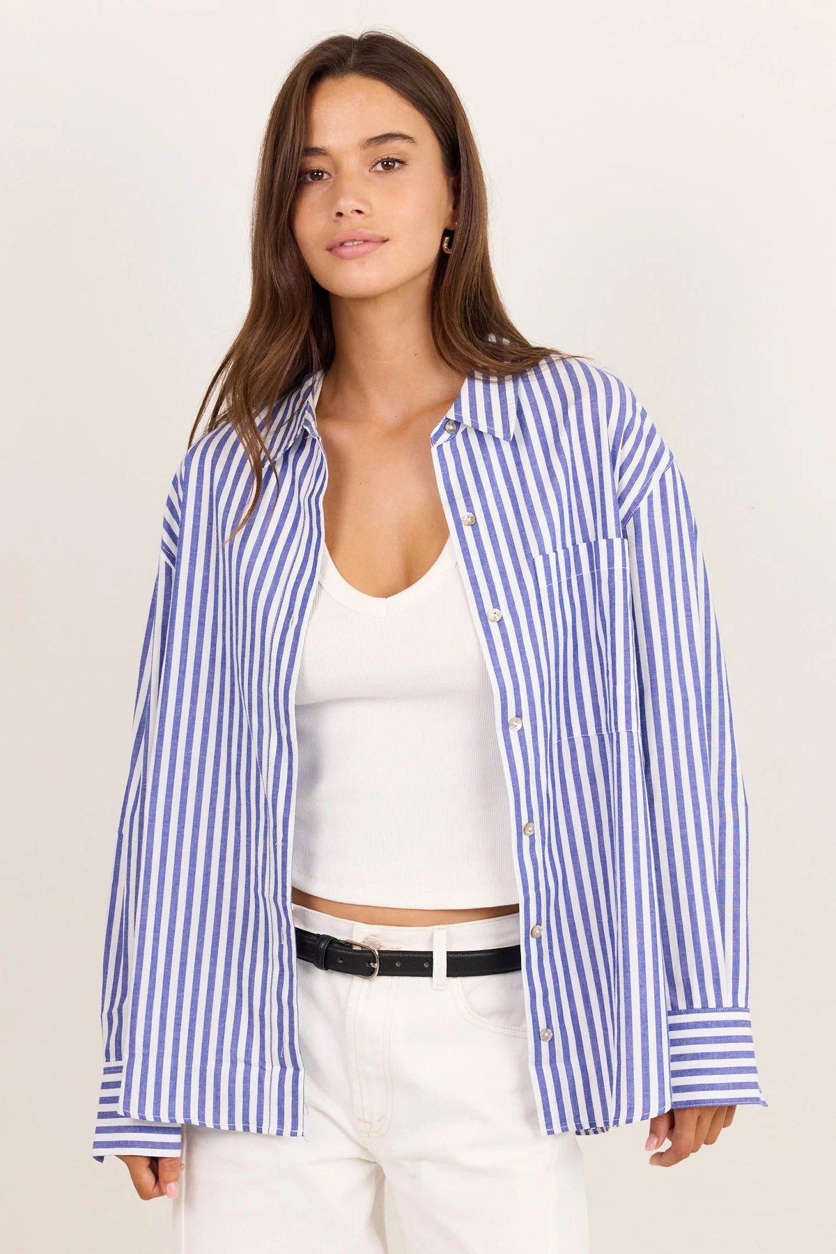 - Long sleeve design
- Button front
- Oversized fit
- Fabric Composition 100% Cotton
