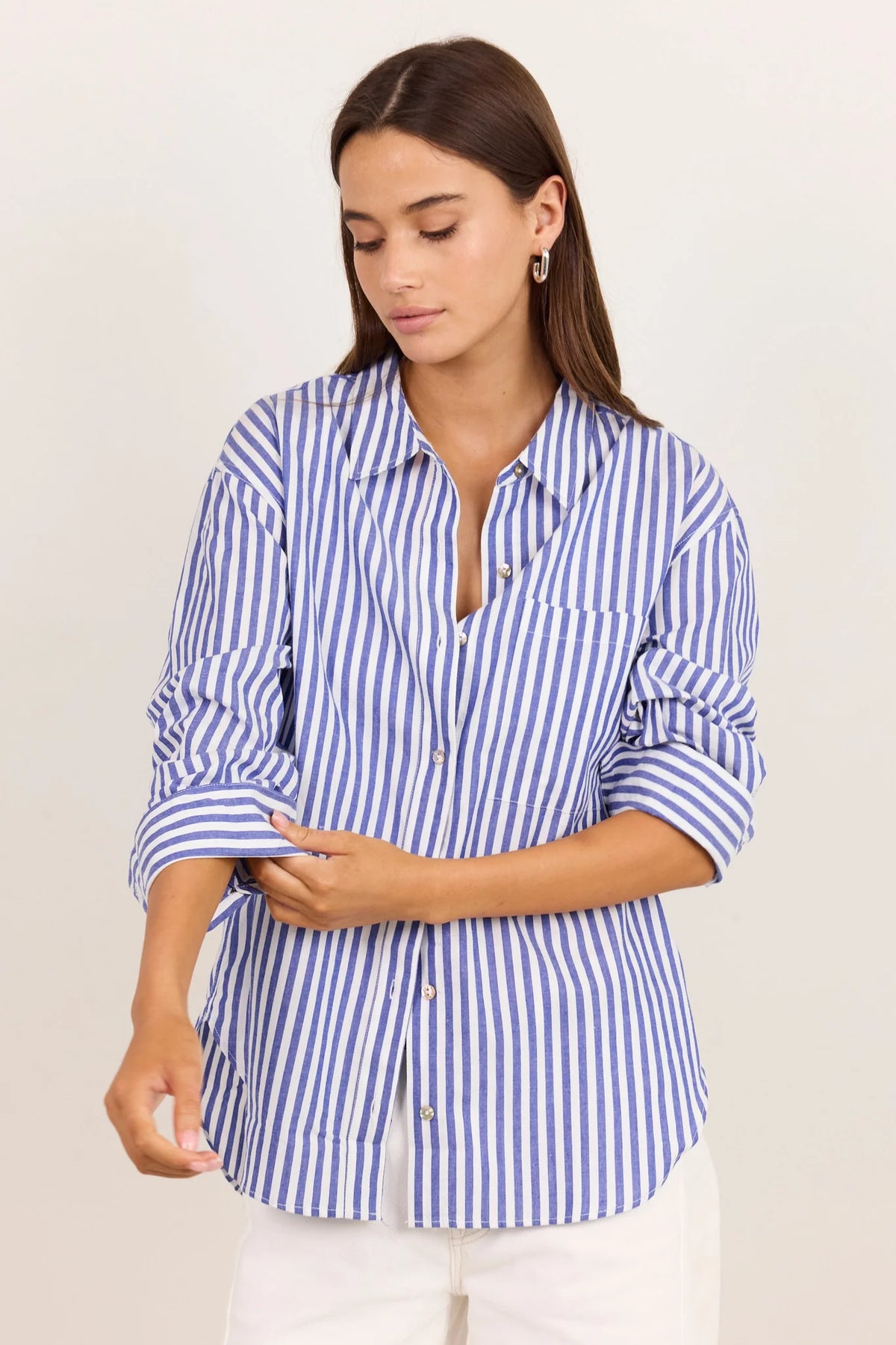 - Long sleeve design
- Button front
- Oversized fit
- Fabric Composition 100% Cotton