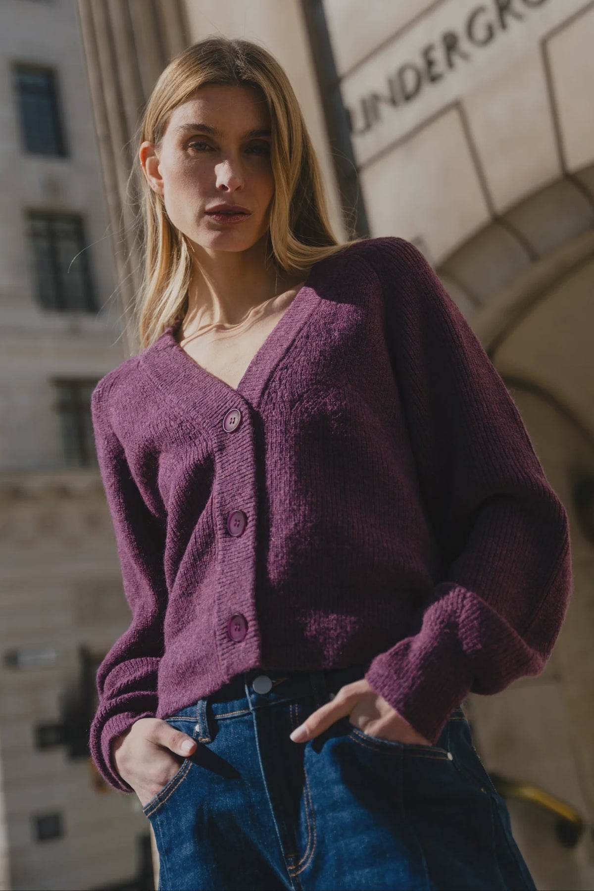 - Long sleeves with subtle puff
- Button front
- Soft, textured knit
- Fabric Composition - 45% nylon, 30% polyester, 15% acrylic, 10% wool
- Delicate knit, handle with care