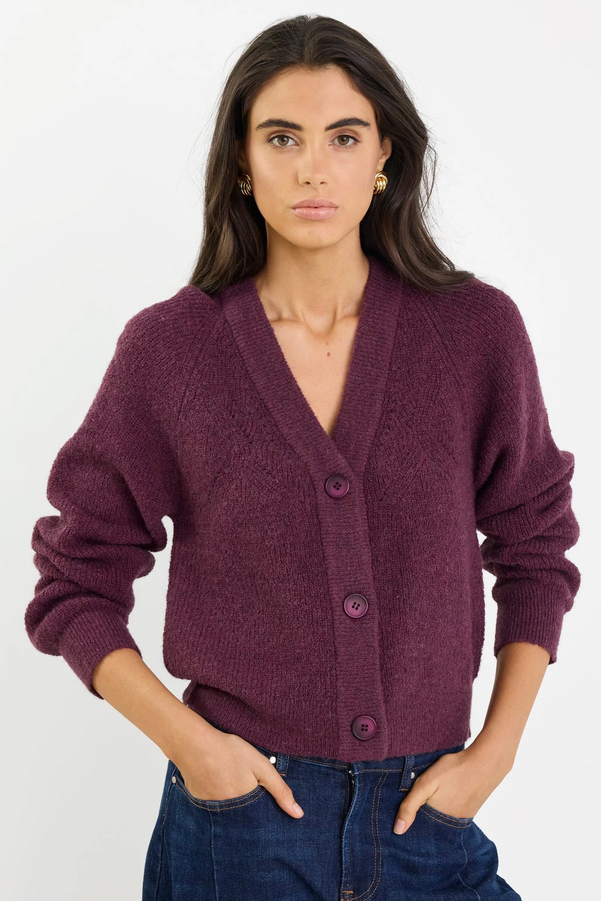 - Long sleeves with subtle puff
- Button front
- Soft, textured knit
- Fabric Composition - 45% nylon, 30% polyester, 15% acrylic, 10% wool
- Delicate knit, handle with care