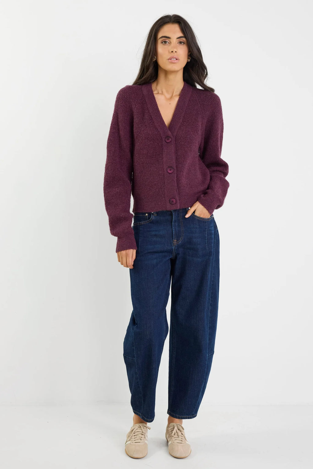 - Long sleeves with subtle puff
- Button front
- Soft, textured knit
- Fabric Composition - 45% nylon, 30% polyester, 15% acrylic, 10% wool
- Delicate knit, handle with care