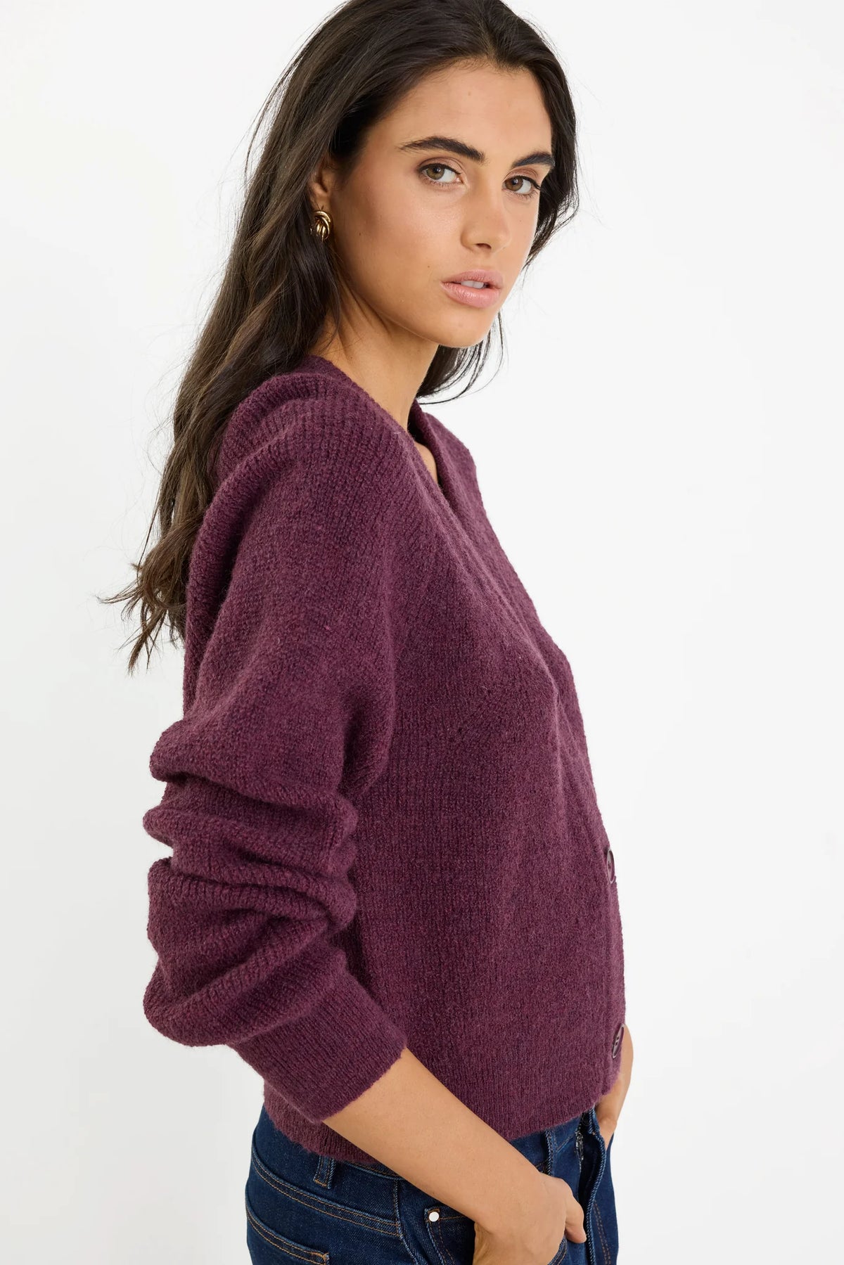 - Long sleeves with subtle puff
- Button front
- Soft, textured knit
- Fabric Composition - 45% nylon, 30% polyester, 15% acrylic, 10% wool
- Delicate knit, handle with care