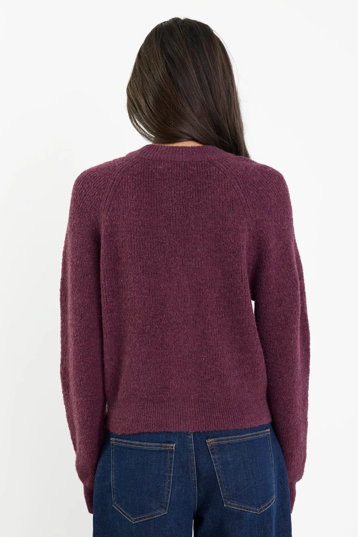 - Long sleeves with subtle puff
- Button front
- Soft, textured knit
- Fabric Composition - 45% nylon, 30% polyester, 15% acrylic, 10% wool
- Delicate knit, handle with care