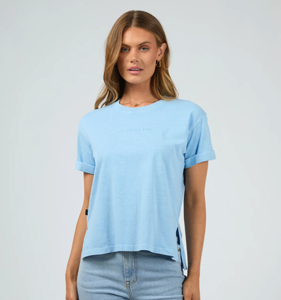 Get ready to rock the weekend with the All About Eve Washed Tee. This trendy top features a stylish garment wash and boasts a branded chest embroidery. Pair it with your favorite denim jeans and sneakers for the ultimate chic and effortless look.