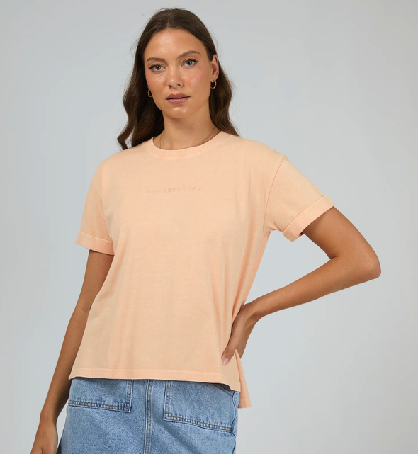 Get ready to rock the weekend with the All About Eve Washed Tee. This trendy top features a stylish garment wash and boasts a branded chest embroidery. Pair it with your favorite denim jeans and sneakers for the ultimate chic and effortless look.