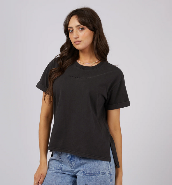 Get ready to rock the weekend with the All About Eve Washed Tee. This trendy top features a stylish garment wash and boasts a branded chest embroidery. Pair it with your favorite denim jeans and sneakers for the ultimate chic and effortless look.