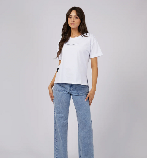 Get ready to rock the weekend with the All About Eve Washed Tee. This trendy top features a stylish garment wash and boasts a branded chest embroidery. Pair it with your favorite denim jeans and sneakers for the ultimate chic and effortless look.