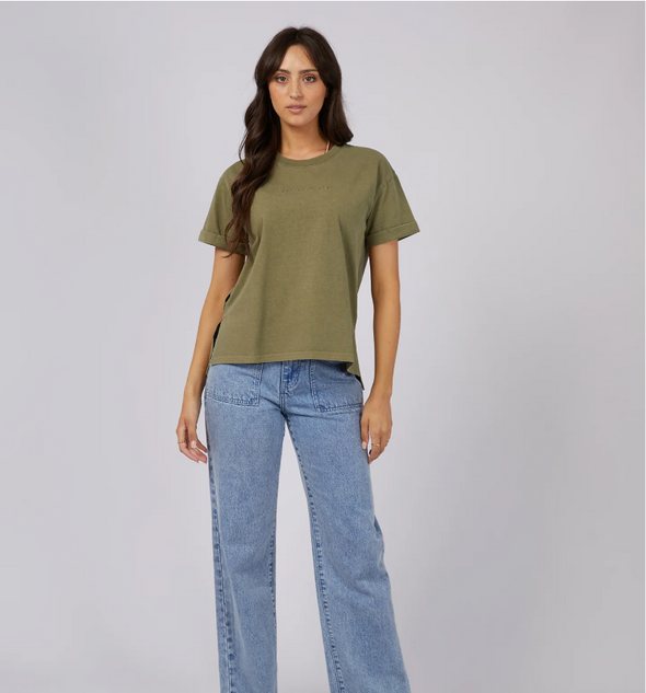 Get ready to rock the weekend with the All About Eve Washed Tee. This trendy top features a stylish garment wash and boasts a branded chest embroidery. Pair it with your favorite denim jeans and sneakers for the ultimate chic and effortless look.