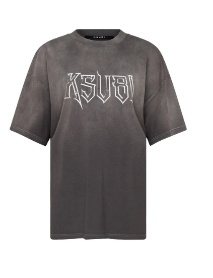 Indulge yourself in luxury with the Kingdom Boyfriend SS Tee Charcoal. Made from premium heavyweight cotton jersey, this boxy oversized t-shirt boasts an exclusive Ksubi art graphic screen printed on the front. With a dropped shoulder and raw cut back hem, it exudes sophistication with a vintage hand feel. Elevate your wardrobe with this must-have piece, finished with T-box embroidery.