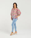Floral blouse with three-quarter voluminous sleeves

Back button detailing for a chic touch

Relaxed silhouette perfect for summer styling

Crafted from 85% Tencel, 15% Nylon for softness and breathability

A versatile piece to dress up or down with ease