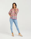 Floral blouse with three-quarter voluminous sleeves

Back button detailing for a chic touch

Relaxed silhouette perfect for summer styling

Crafted from 85% Tencel, 15% Nylon for softness and breathability

A versatile piece to dress up or down with ease