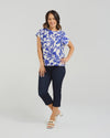 Short sleeve blouse in a bold cobalt floral print

Feminine lace trim accents on the sleeves

Relaxed, easy-to-wear fit with flattering drape

Lightweight 80% Viscose, 20% Nylon blend

A versatile piece for day-to-night styling
