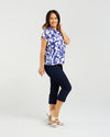 Short sleeve blouse in a bold cobalt floral print

Feminine lace trim accents on the sleeves

Relaxed, easy-to-wear fit with flattering drape

Lightweight 80% Viscose, 20% Nylon blend

A versatile piece for day-to-night styling