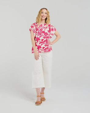 Short sleeve blouse in a vibrant magenta floral print

Romantic lace trim detailing at the sleeves

Relaxed, flattering fit for versatile styling

Lightweight 80% Viscose, 20% Nylon blend

Easy to style from casual to elevated occasions