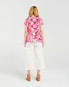 Short sleeve blouse in a vibrant magenta floral print

Romantic lace trim detailing at the sleeves

Relaxed, flattering fit for versatile styling

Lightweight 80% Viscose, 20% Nylon blend

Easy to style from casual to elevated occasions