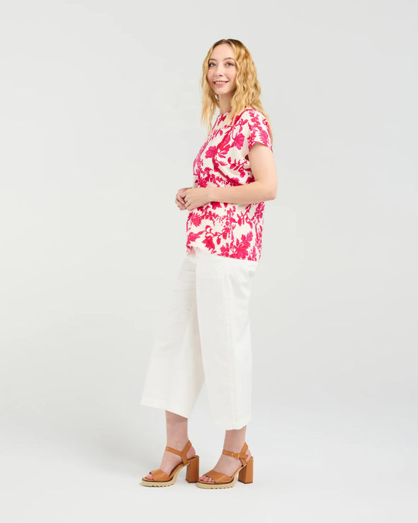 Short sleeve blouse in a vibrant magenta floral print

Romantic lace trim detailing at the sleeves

Relaxed, flattering fit for versatile styling

Lightweight 80% Viscose, 20% Nylon blend

Easy to style from casual to elevated occasions