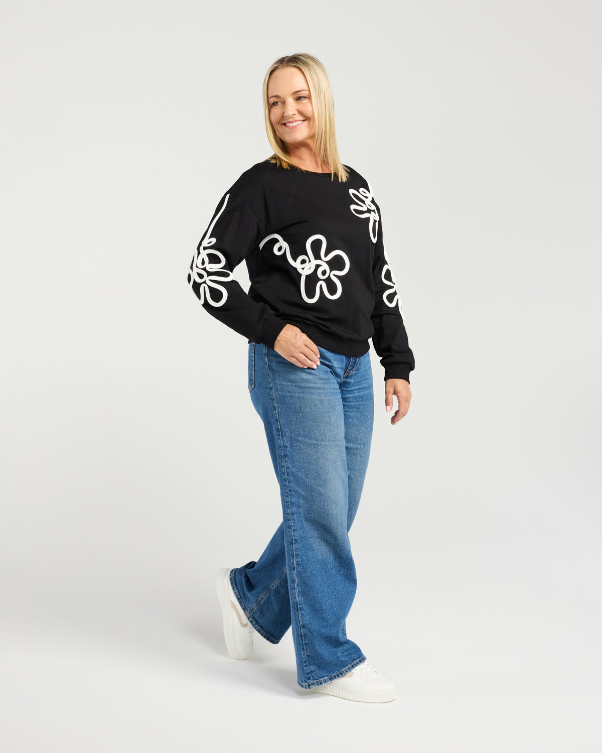 • Classic sweater silhouette with elevated detailing
• Textured floral appliqués for depth and visual interest
• Soft and comfortable everyday style
• Feminine statement piece with subtle sophistication
• Perfect for relaxed yet polished winter outfits
• Fabric: 93% Cotton, 7% Spandex