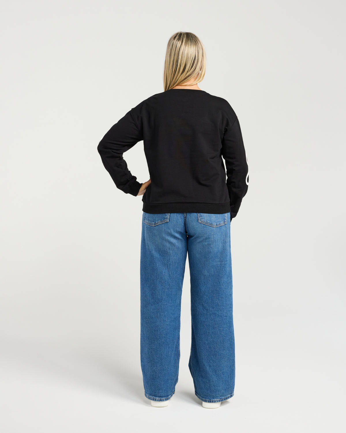 • Classic sweater silhouette with elevated detailing
• Textured floral appliqués for depth and visual interest
• Soft and comfortable everyday style
• Feminine statement piece with subtle sophistication
• Perfect for relaxed yet polished winter outfits
• Fabric: 93% Cotton, 7% Spandex