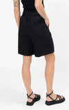 High-waisted fit with a sleek fly front and hook closure

Elasticated waistband at the back for comfort

Relaxed wide-leg silhouette

Functional pockets for everyday ease

Belt loops for versatile styling

Made from breathable 100% linen

Standard fit with no stretch