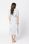 Midi length for a versatile silhouette

Flattering V-neckline

Puffed short sleeves for a romantic touch

Button-down front closure

Lightweight and breathable fabric