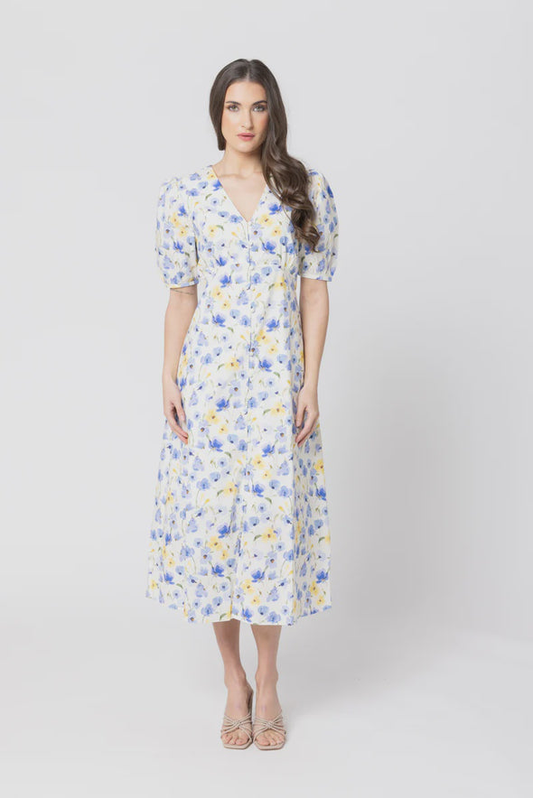 Midi length for a versatile silhouette

Flattering V-neckline

Puffed short sleeves for a romantic touch

Button-down front closure

Lightweight and breathable fabric